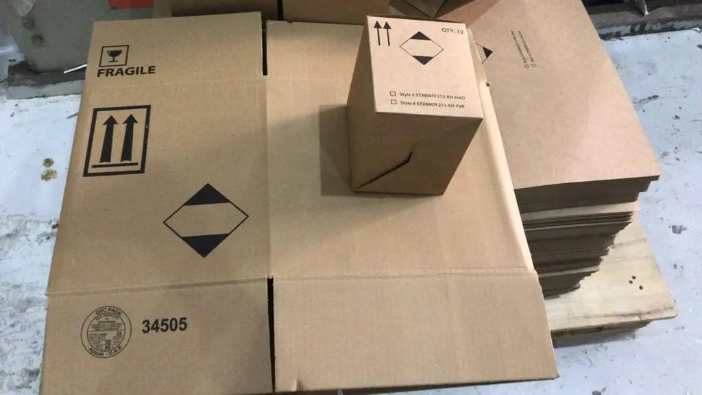 Flat cartons printed with handling marks